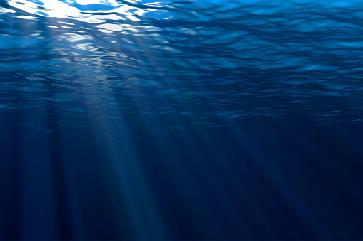 Deep Blue Ocean Waves From Underwater Background Light Rays Stock ...