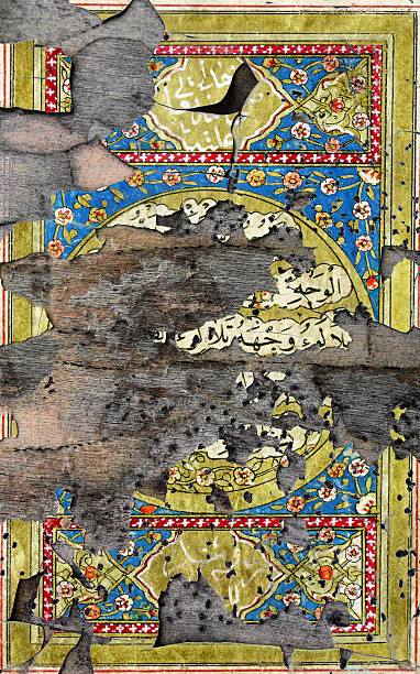 istock Gold leaf ornaments painted on a grunge plank 639260598
