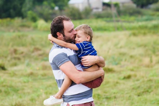 istock Father holds his son 639264926
