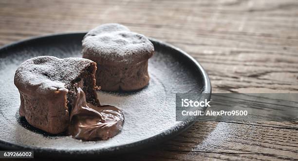 Chocolate Lava Cakes In The Shape Of Heart Stock Photo - Download Image Now - Chocolate, Melting, Icing