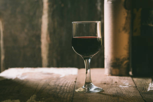istock Glass of wine on a table 639270956