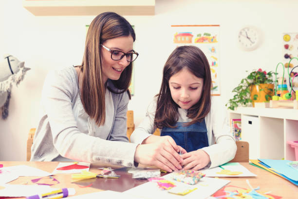 istock Mother with creative kid having fun time together 639271070