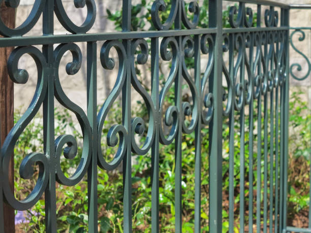 istock Green Iron Fence 639271996