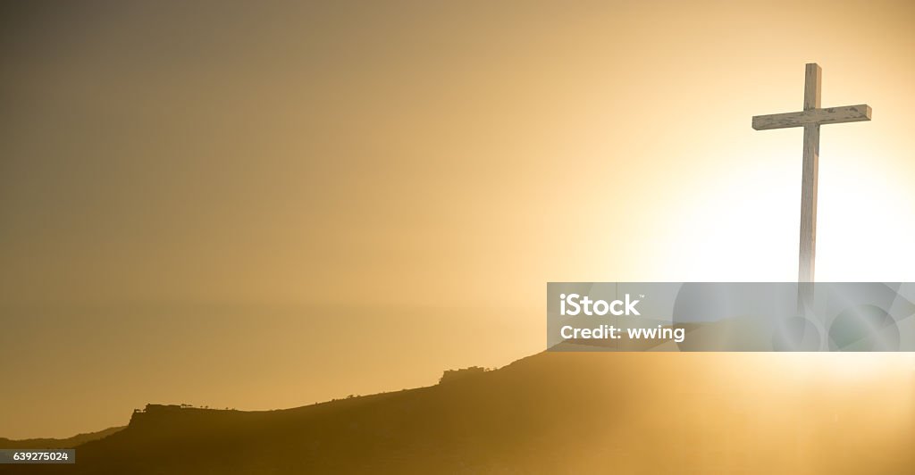 Crucifix at sunrise on Easter morning- copy space Crucifix at sunrise on Easter morning - copy space Religious Cross Stock Photo