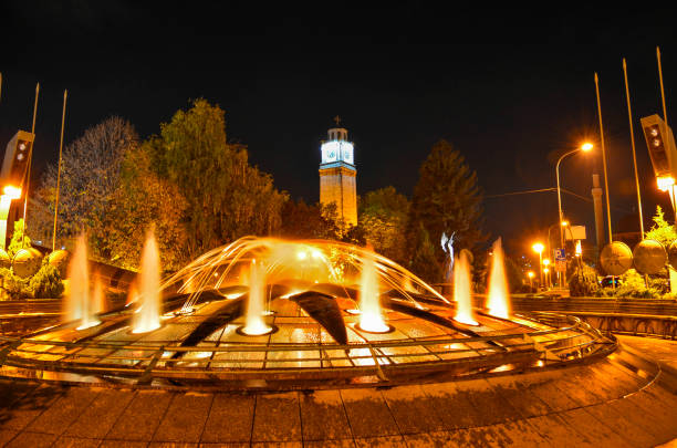 istock Clock  Tower with fountain at night - Magnolia Square - Bitola 639275230