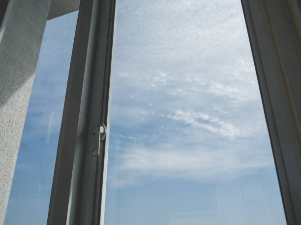 istock Loneliness window and sky. 639280290