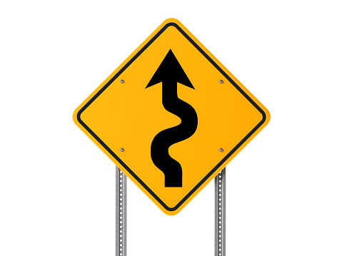 Yellow very curvy conditions ahead road sign. Risk and alertness concept. Isolated on white background. Clipping path is included. Horizontal composition with copy space. Great use as a methapor for extremely difficult and risky conditions in general.