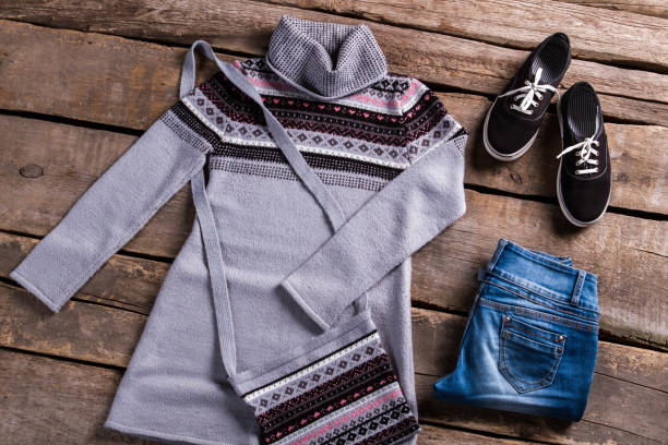 istock Gray tunic with blue jeans. 639291306