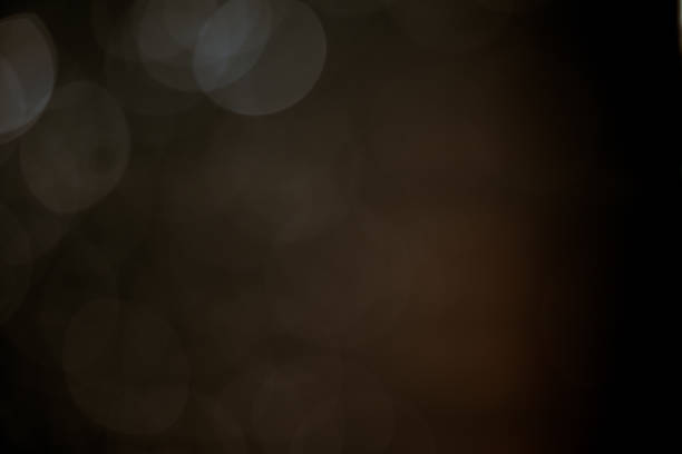 istock bokeh of lights on black background 639299534