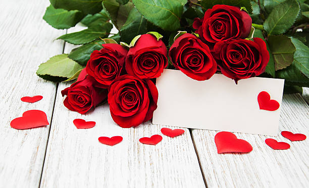 istock Red roses and greeting card 639300038