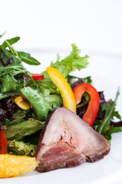 istock Fresh salad with ham and greens 639300090