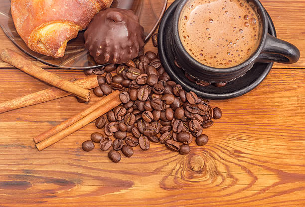 istock Brewed coffee, coffee beans, cinnamon sticks, chocolate truffle 639301096