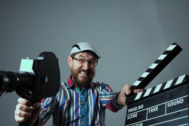 istock Screaming man retro movie camera and clapperboard 639306148