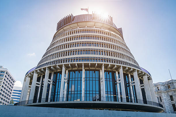 Beehive Wellington against the Sun, New Zealand The Beehive, New Zealand's Parliament Building, against the Sun. Wellington, North Island, New Zealand, Oceania beehive new zealand stock pictures, royalty-free photos & images