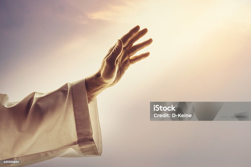 Blessing Male hands reaching sunlight Jesus Christ Stock Photo