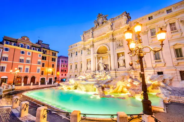 Rome, Italy. Stunningly ornate Trevi Fountain, built in, illuminated at night in the heart of Roma.