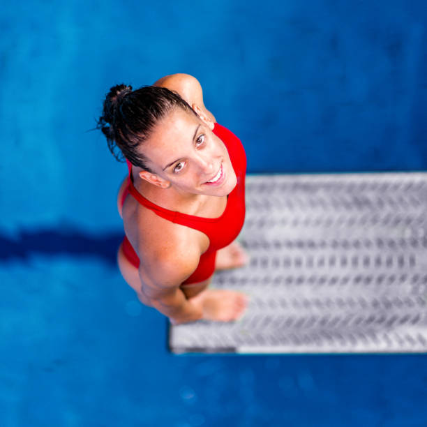 istock Female springboard diver, looking at the camera 639307034