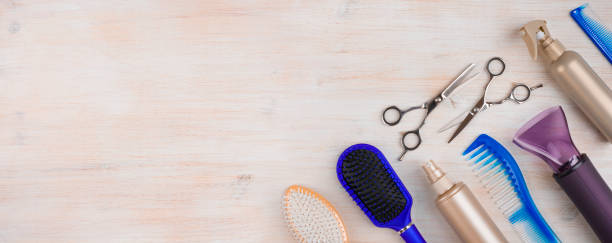 istock Professional hairdresser tools on wooden surface with copyspace at left 639310102