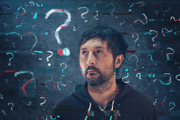 istock Confused man with so many questions 639310290