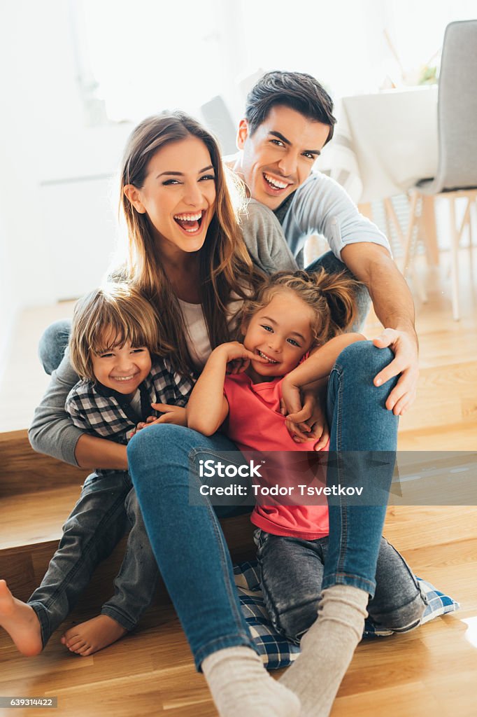 Young happy family Young happy family at home. Family Stock Photo