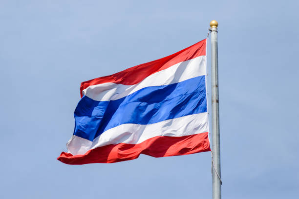 istock Waving Thai flag with blue sky background 639315022