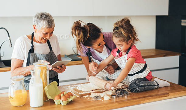istock Family making cookies in the kitchen 639315984