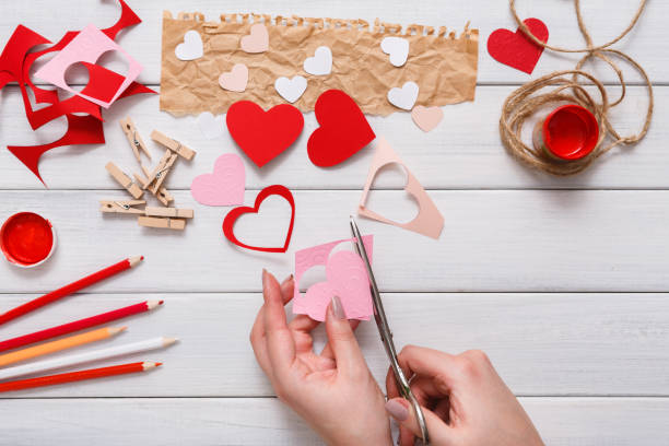 istock Valentine day handmade scrapbooking background, cut and paste hearts card 639318486
