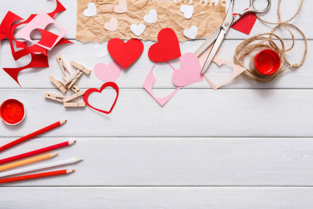 istock Valentine day handmade scrapbooking background, cut and paste hearts card 639318552