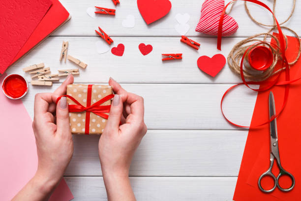 istock Valentine day handmade present background, cut and paste hearts card 639318616