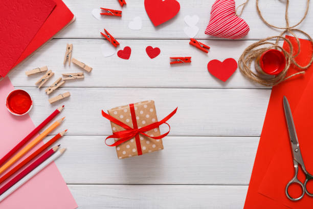 istock Valentine day handmade present background, cut and paste hearts card 639318684