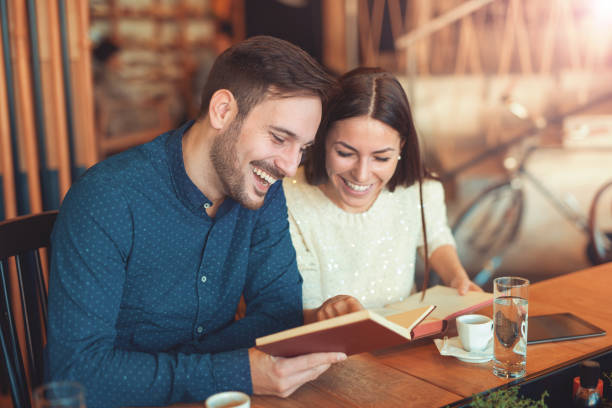 istock Young students drinking coffee and preparing for seminar. Educat 639321928