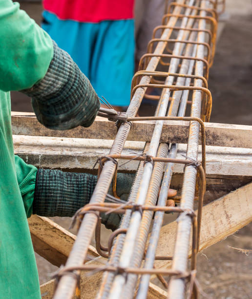 istock Worker tying steel in the construction site 639324772