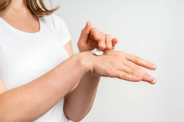 istock Female hands applying hand cream 639324958
