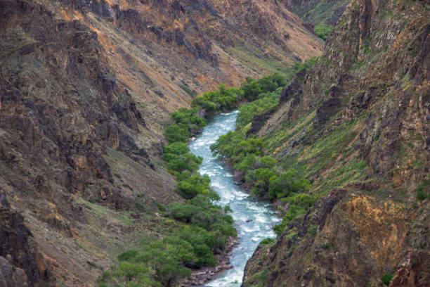 istock River in Charyn canyon and cloudly sky, Kazakhstan 639325372