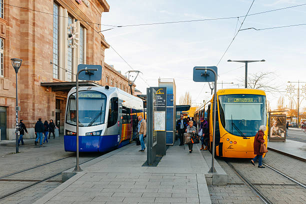 blaue und gelbe straßenbahn in frankreich - aerial passenger line stock-fotos und bilder