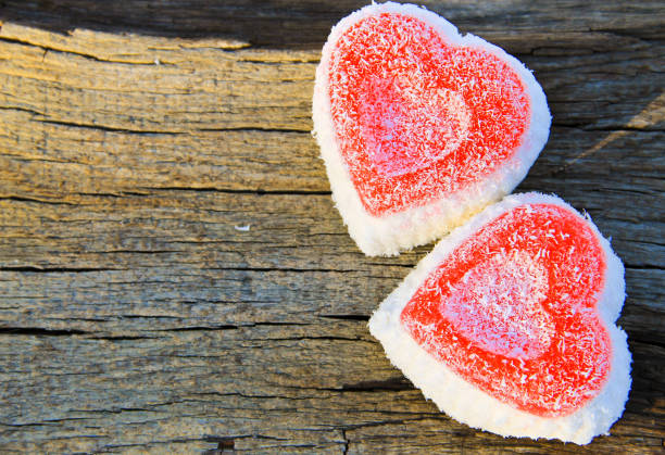 istock Heart shaped cake on wooden background 639326360