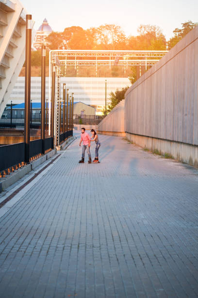 istock Couple of inline skaters. 639326776