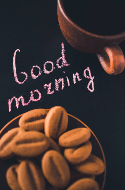 istock Coffee and Cookie on a Dark Background. Inscription Good Morning. 639327232