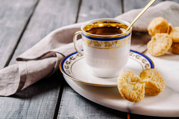 istock Cup of tea and cookies 639328122