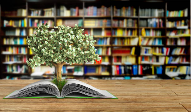 tree growing from book A big open book tree growing from book A big open book 3d render Success knowlage concept financial education stock pictures, royalty-free photos & images