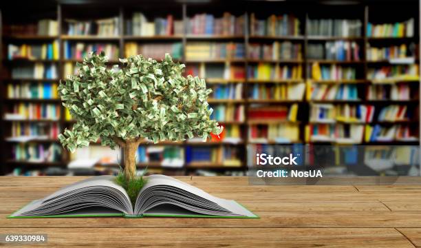 Tree Growing From Book A Big Open Book Stock Photo - Download Image Now - Education, Finance, Learning