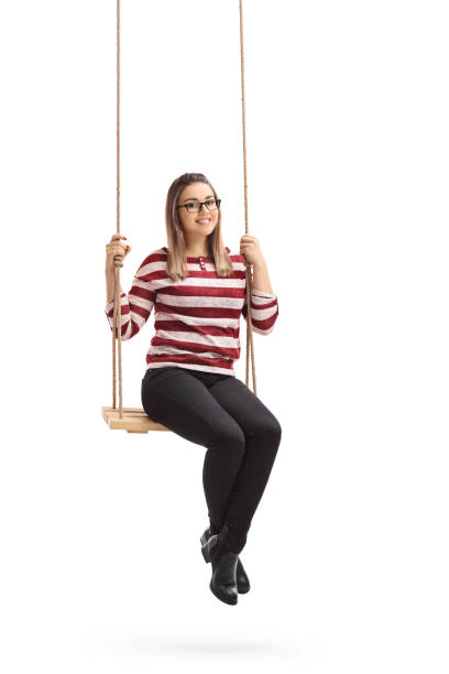 istock Happy girl sitting on a swing 639335734
