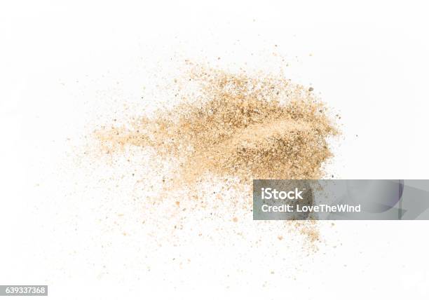 Sand Explode On White Background Throwing Freeze Stop Motion Stock Photo - Download Image Now