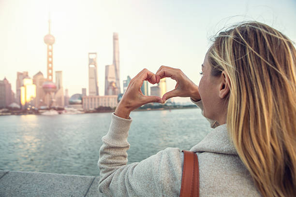 istock Young woman loving Shanghai 639338328