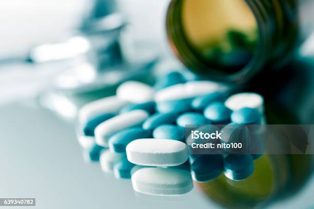 Pills And Stethoscope Stock Photo - Download Image Now - Sleeping Pill, Antibiotic, Capsule - Medicine