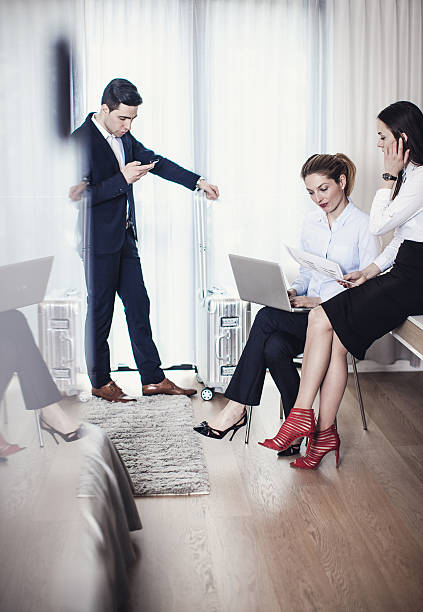 istock Business People Working in a Hotel Room 639342180