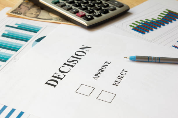 istock Decision paper, calculator, financial graph,  japanese banknote 639342184