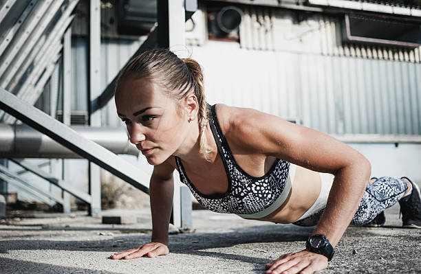 istock Female Athlete Doing Planks 639344442