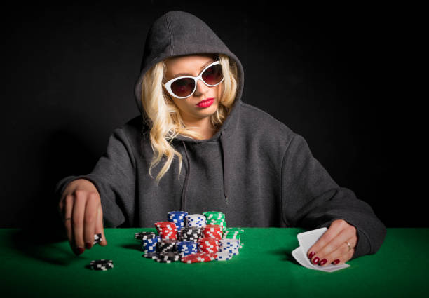 istock Professional poker player with glasses 639345254