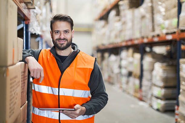 istock Working hard. Wearhouse workers. 639347210